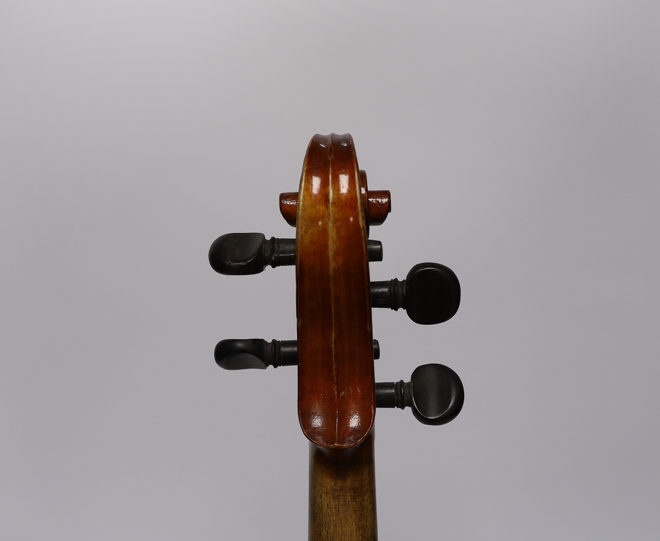 A cased 3/4 sized student violin marked Dresden, with reproduction Stradivarius label